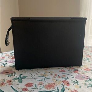 Vintage Pierre Cardin black clutch.